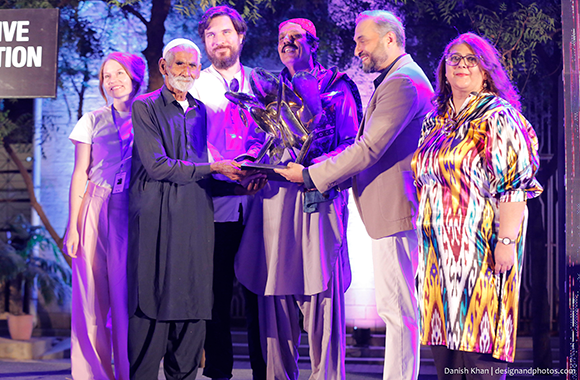 Invisible Flock & Faqir Zulfiqar receiving KB22 Juried Art Prize